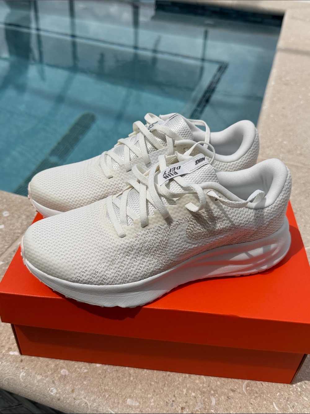 NEW Nike Women's All-White Run Defy Lightweight Knit Running Sneakers